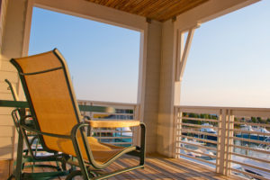 a view from a balcony with a chair