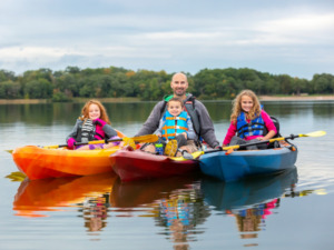 family kayaking